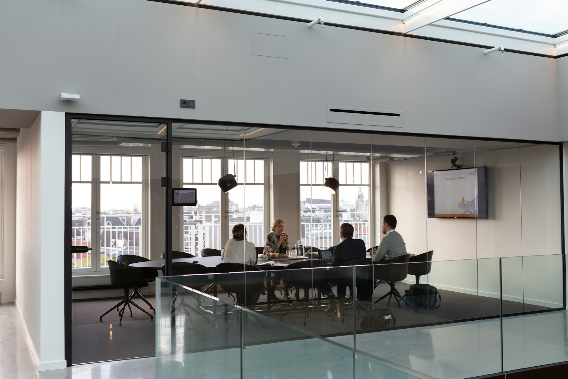 This photograph shows a meeting between a boss and employees at a table in a conference room. It’s a stock image so the individuals should not be identified. It’s being used to illustrate that the article it represents is about What and When to Tell Employees About Selling Your Business. The text alternative is “What and When to Tell Employees About Selling Your Business” as this best describes the intended impression.
